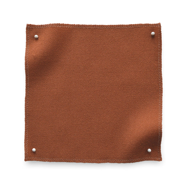 Shop Red Ochre fabric - Wool Crepe at Supply Showroom. Made from 100% wool, 140cm wide. Sold by the yard. Lead time: 1-2 weeks in stock, 6-8 weeks out of stock.