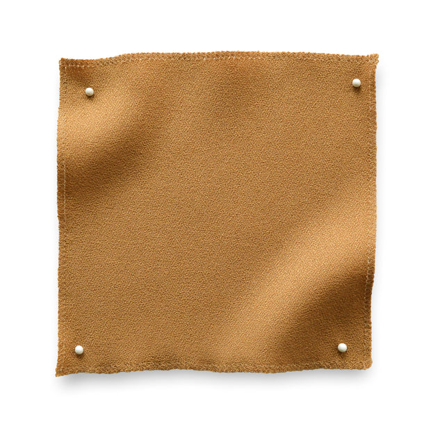 Shop Nutmeg fabric - Wool Crepe at Supply Showroom. Made from 100% wool, 140cm wide. Sold by the yard. Lead time: 1-2 weeks in stock, 6-8 weeks out of stock.