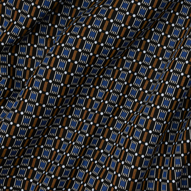 Close-up view of a fabric with a geometric pattern featuring black, blue, and brown colors.