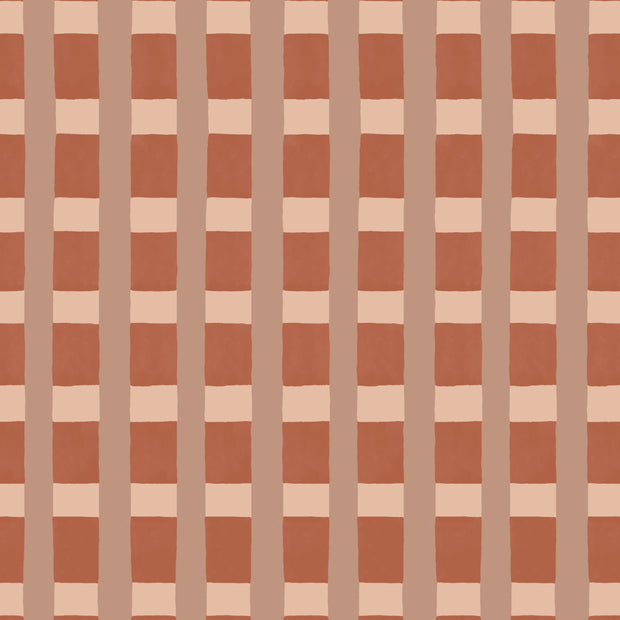 A close-up view of a wallpaper with a checkered pattern featuring dusty rose and pink shades - Brick Wallpaper | Arty Check, Eco Non Woven, 52cm Trimmed, 10m Roll