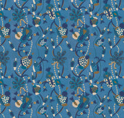 Patterned fabric with intricate design on a blue background