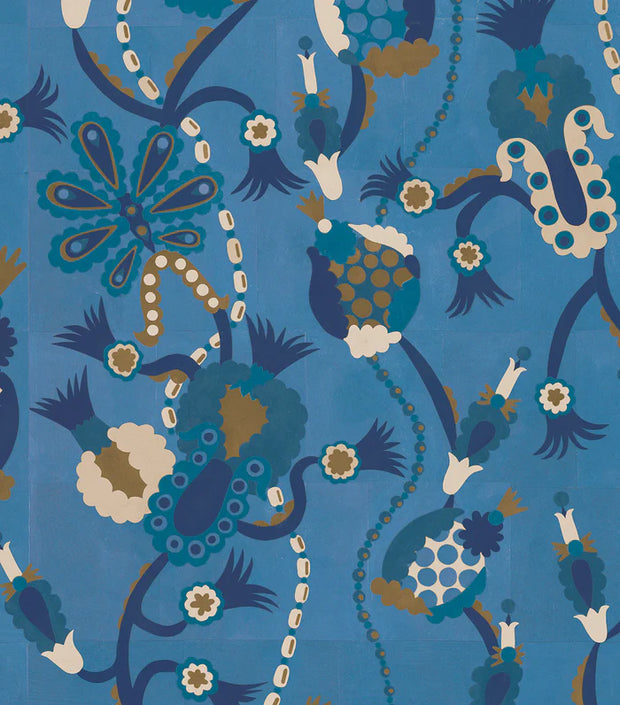 A yard of fabric featuring a botanical and geometric pattern in beige, blue, brown, and dark blue colors on a blue background.