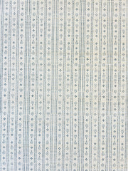 A close-up view of a section of wallpaper with a geometric pattern featuring diamond shapes in beige and blue colors - Ice Navy Grasscloth Wallpaper – Birdlip Path Collection | Natural Wallcovering