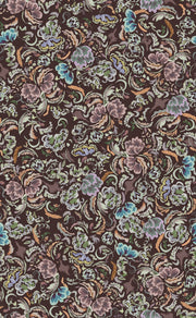 A fabric with a floral pattern featuring various colors such as blue, brown, green, and purple.