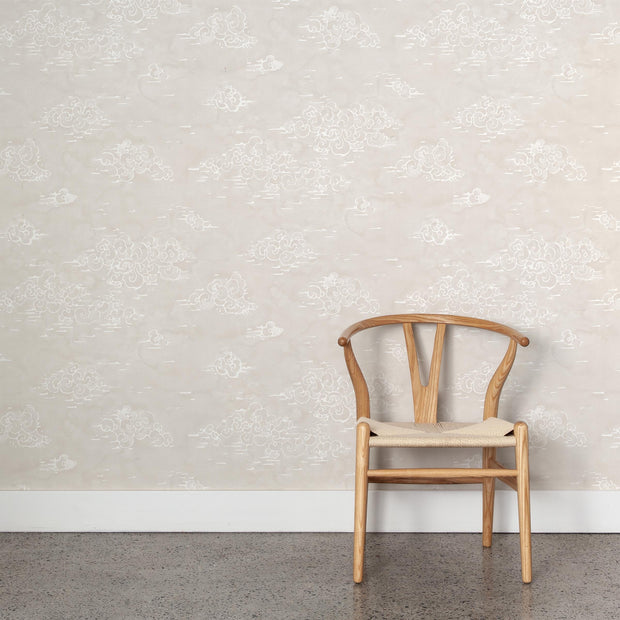 Wooden chair against a light floral-patterned wall - Airy – Halcyon Wallpaper | Half Drop Match | 28" Trimmed | Sold by Yard