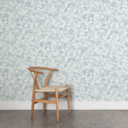 Wooden chair against a floral patterned wall - Raindrop – Sunlit Wallpaper | 28" Trimmed Width | Sold by Yard
