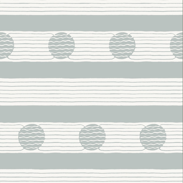 A section of wallpaper with a striped pattern featuring round designs in shades of gray and white.