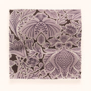 A yard of folk floral patterned fabric in purple and gray colors with a traditional design, sold by the yard and measuring 144cm in width.