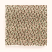 Yard fabric with a leaf pattern in beige, brown, and green colors