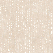 Close-up of a textured beige and white wallpaper with an abstract pattern.