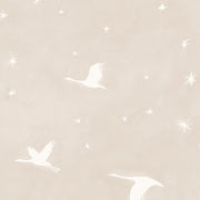 A yard of wallpaper featuring a graphic pattern with birds and stars on a beige background.