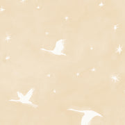 A yard of wallpaper with a starlit pattern featuring birds and stars on a beige background.