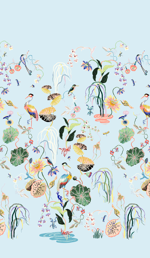 A wallpaper featuring a floral and animal pattern with a blue tint and a heron among the plants. Heron Garden Wallpaper in Blue Tint | Sarah Gordon Design