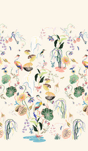 A wallpaper featuring a vibrant floral and botanical design with birds and other wildlife in a cream color palette. Heron Garden Wallpaper in Cream | Sarah Gordon Design
