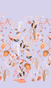 A wallpaper featuring a floral design with lilac and coral hues, incorporating images of birds and botanical elements. Heron Garden Wallpaper in Lilac & Coral | Sarah Gordon Design