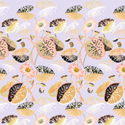 A wallpaper pattern featuring a botanical floral design with lilac, pink, and purple colors, and a rattan texture. Lilac & Rattan Wallpaper – Lily Pad | 27" Clay-Coated Roll
