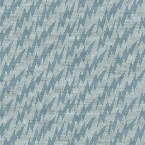 Yard fabric with a light blue color featuring a geometric lightning bolt pattern.