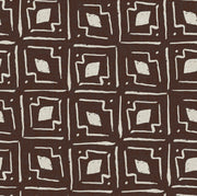 A fabric with a geometric pattern featuring diamonds in beige and brown colors.