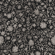 A close-up view of a floral patterned wallpaper in black, gray, and white colors. Charcoal - Madras Floral Wallpaper by Panel