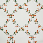 A wallpaper with a geometric lattice design featuring orange, green, and red flowers.