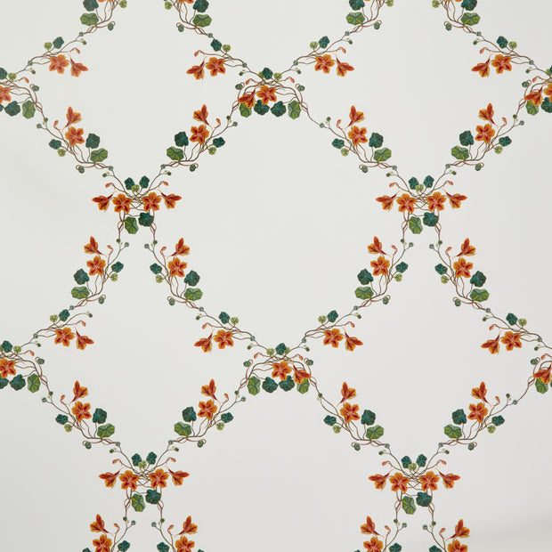 A wallpaper with a geometric lattice design featuring orange, green, and red flowers.