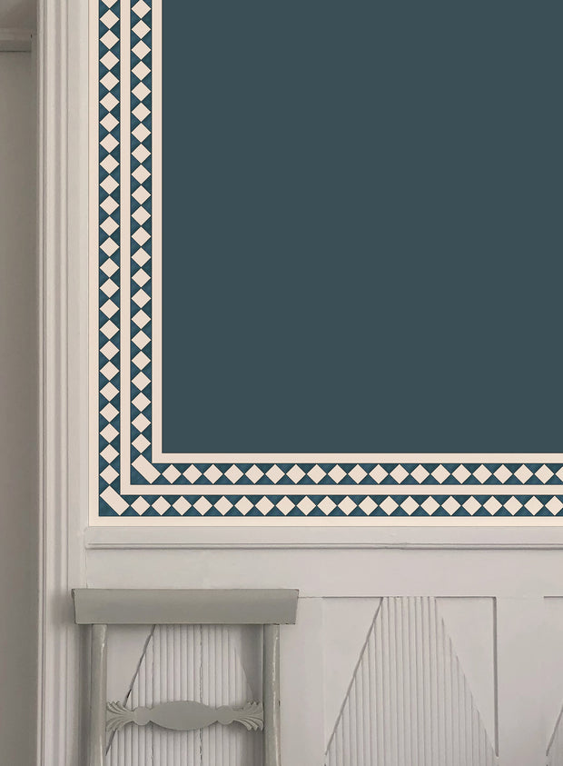 A dark blue wallpaper with a geometric pattern and harlequin trim applied to a wall - Dark Blue - WP Harlequin Wallpaper Border, Non Woven, 10m Roll