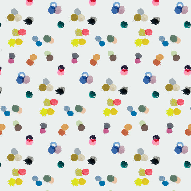 A wallpaper with an abstract geometric pattern featuring various shades of blue, pink, and yellow. Cool Bright Wallpaper – Play Day Design in Clay-Coated Finish