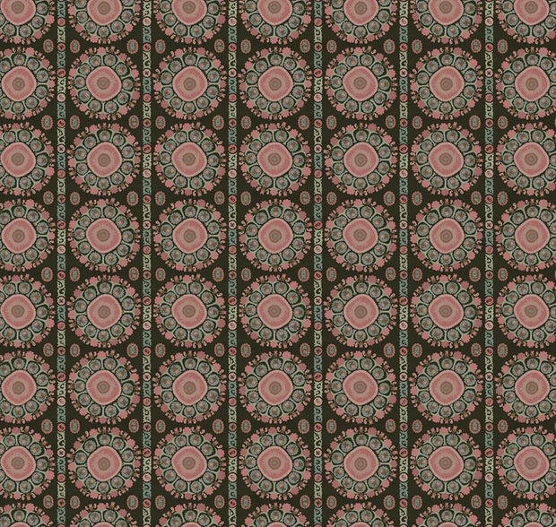 Patterned fabric with pink and green design on a brown background