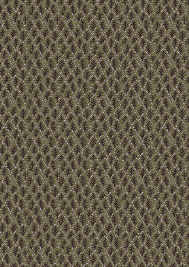 A close-up view of a fabric featuring a microprint of trees in various shades of green and brown.