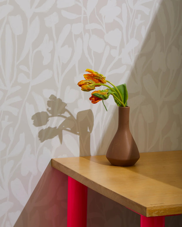 Brown vase with flowers on a wooden table against a patterned wall - Day Late Spring Wallpaper – Botanical 10 Yard Roll