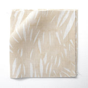 A yard of windswept beige and white flaxen fabric with an abstract pattern.