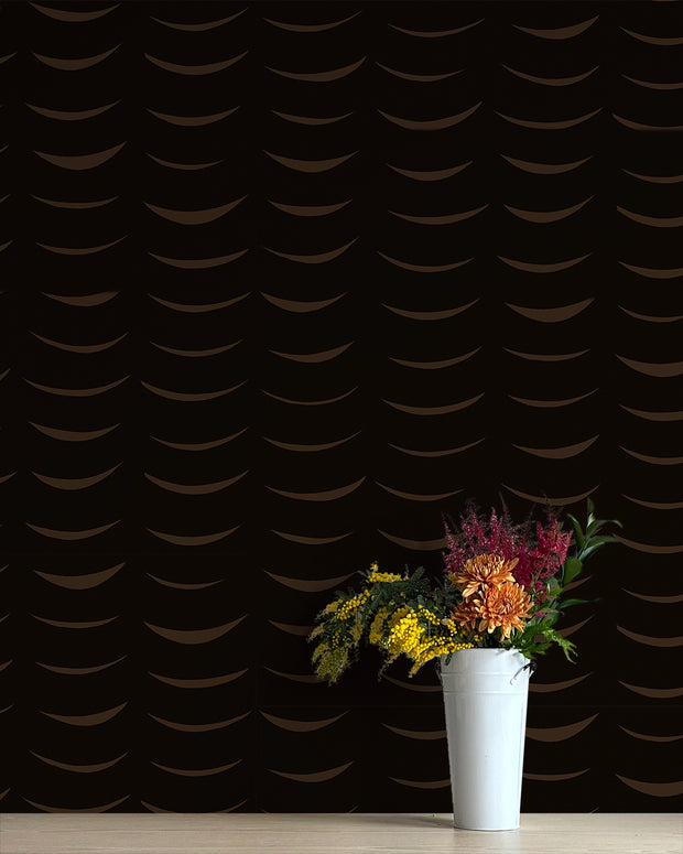 A vase with a bouquet of multicolored flowers placed on a surface with a black and brown geometric patterned wallpaper in the background. - Dark Chocolate Wallpaper – Drape | Non Woven Double Roll Design