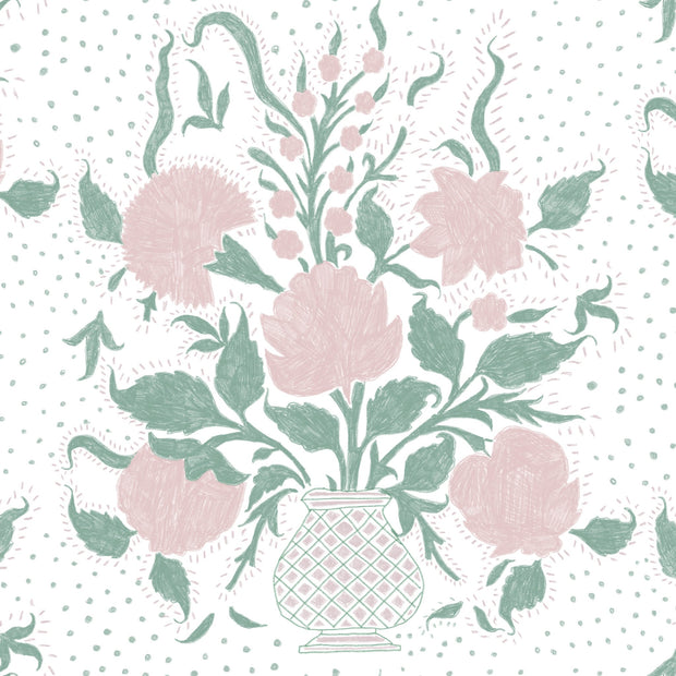 A fabric featuring a floral pattern with pink and green flowers and leaves on a white background with a dotted pattern.