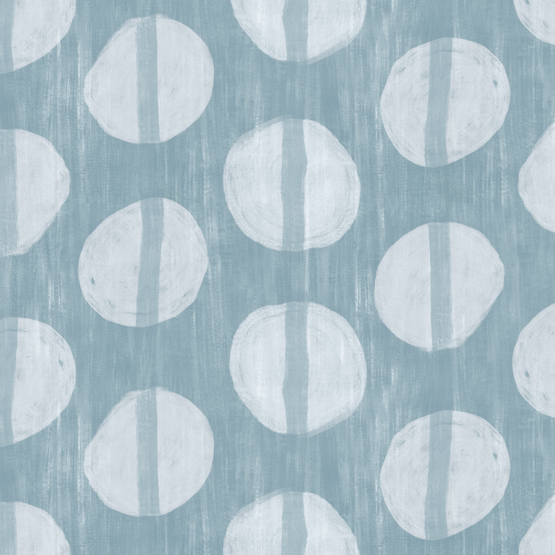 A fabric with a blue background and a white circle pattern repeated over it.
