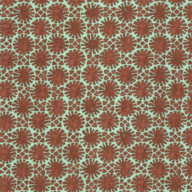 A fabric featuring a geometric pattern with turquoise and brown colors.