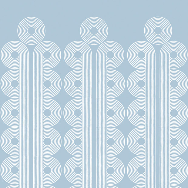 A wallpaper with a geometric pattern in white and blue colors. Sky Poiret Wallpaper – Non Woven Fibre | Sold by Panel | 5–7 Week
