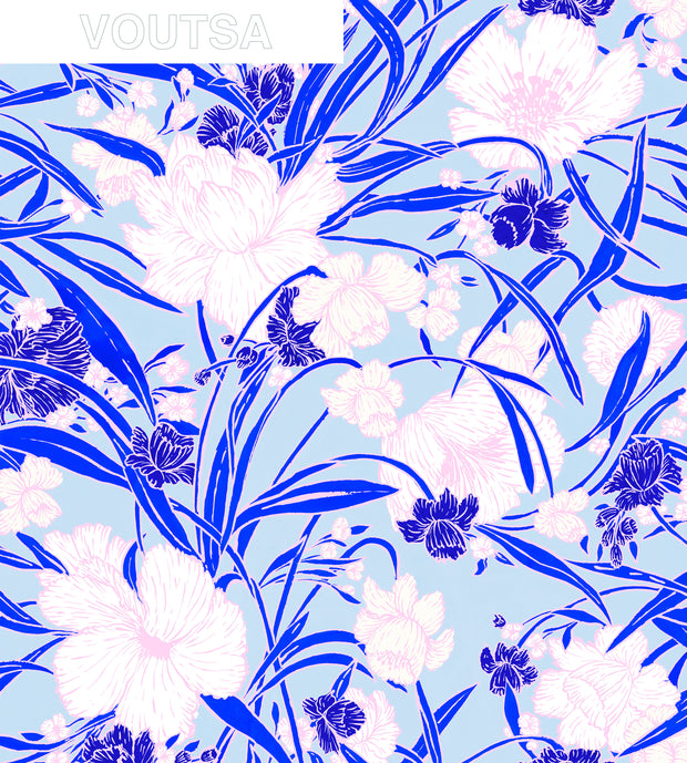 A roll of wallpaper with a floral pattern featuring blue and pink flowers on a white background. Yves Everyday Blooms Wallpaper – Clay Coated Floral Roll Design