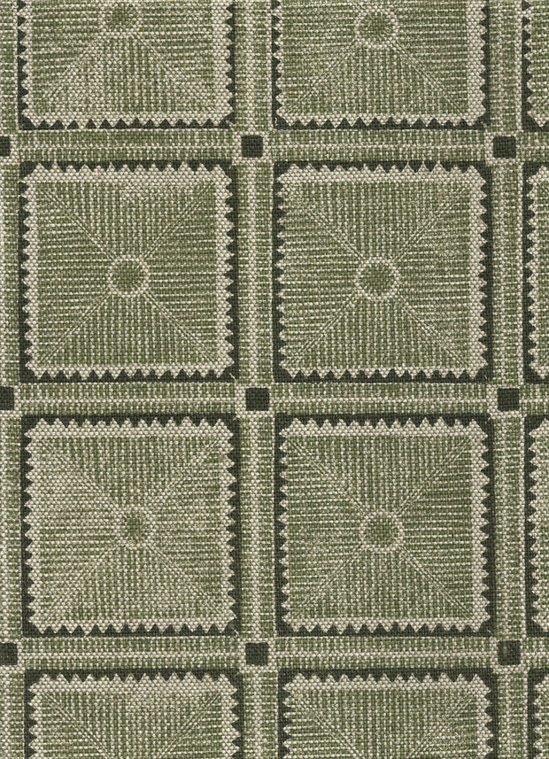A section of fabric featuring a geometric pattern with a green color tone.